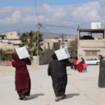 “الخيرية الهاشمية” توزع طروداً غذائية على اللاجئين الفلسطينيين